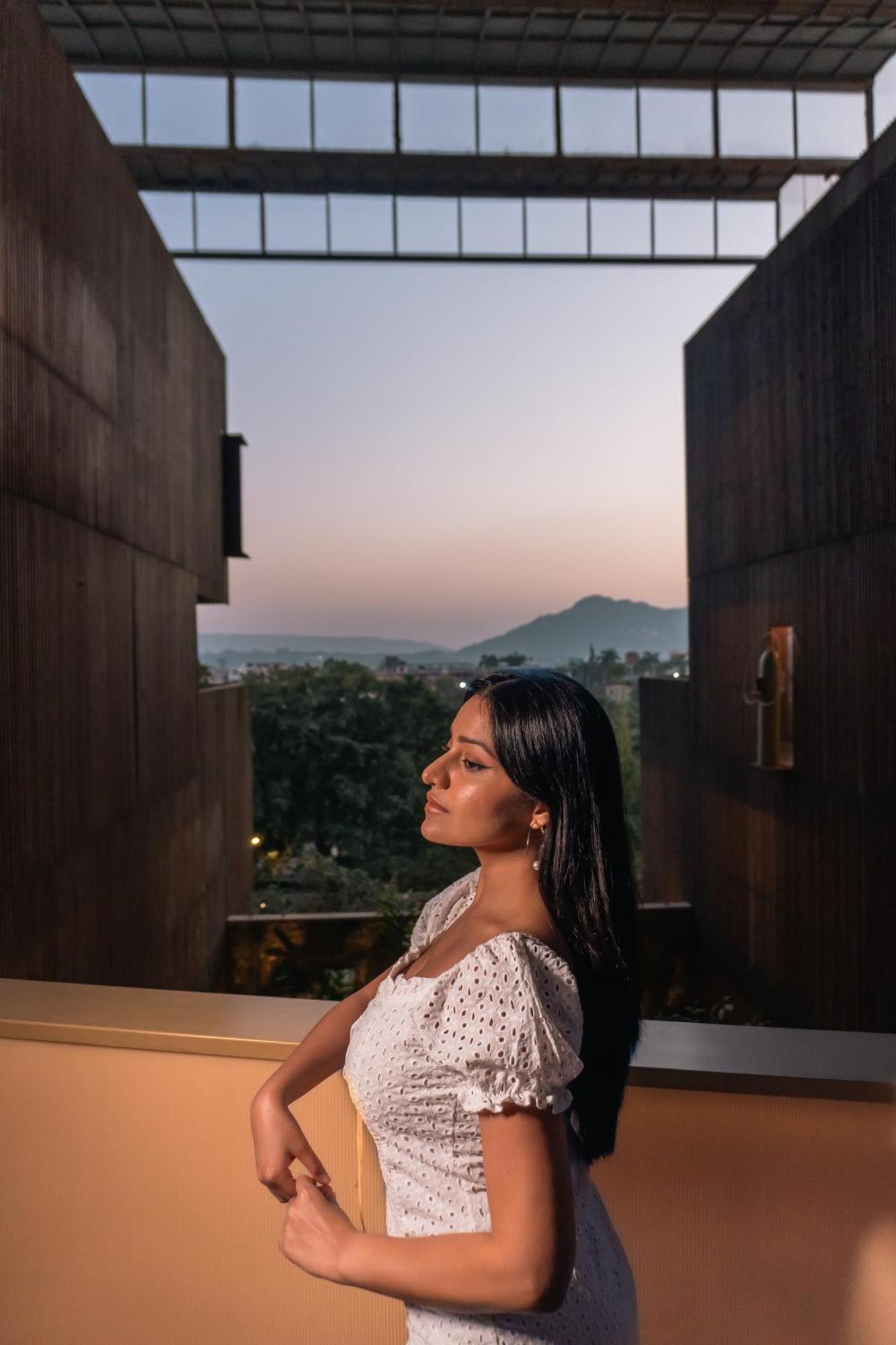 Radisson Resort And Spa Lonavala Ngoại thất bức ảnh A woman in contemplation